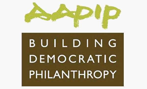 Logo with AAPIP in green above Building Democratic Philanthropy in white text on a brown background