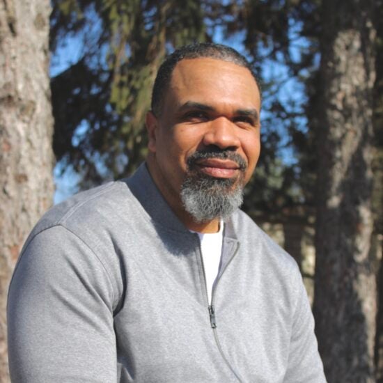 Lionel Allen, Jr. smiles toward the camera